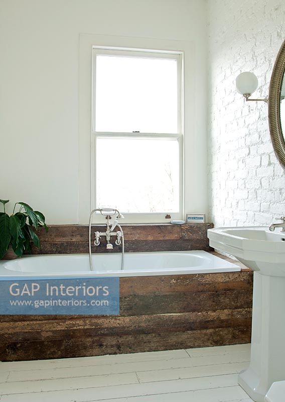 Bath with distressed timber surround