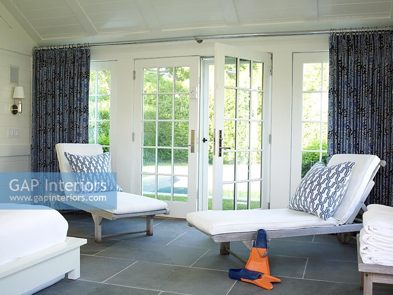 Bedroom with Chaise Lounges next to french doors