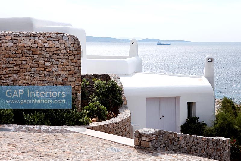 Exterior of Greek villa with sea view