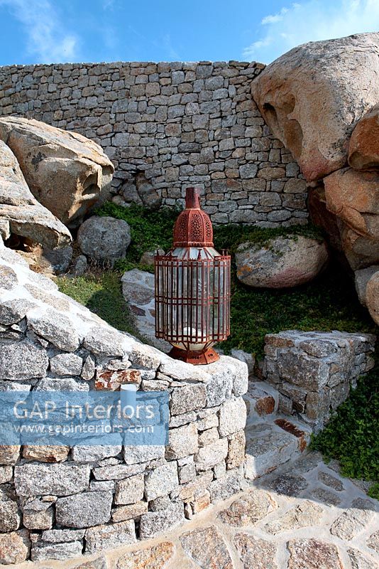 Lantern on stone wall