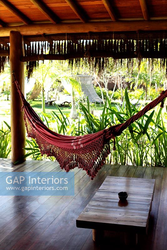 Tropical porch with hammock 
