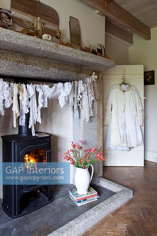 Vintage clothing hanging by stove