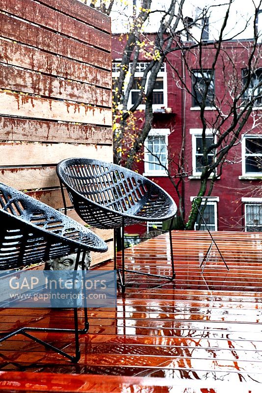 Garden chairs on decked patio