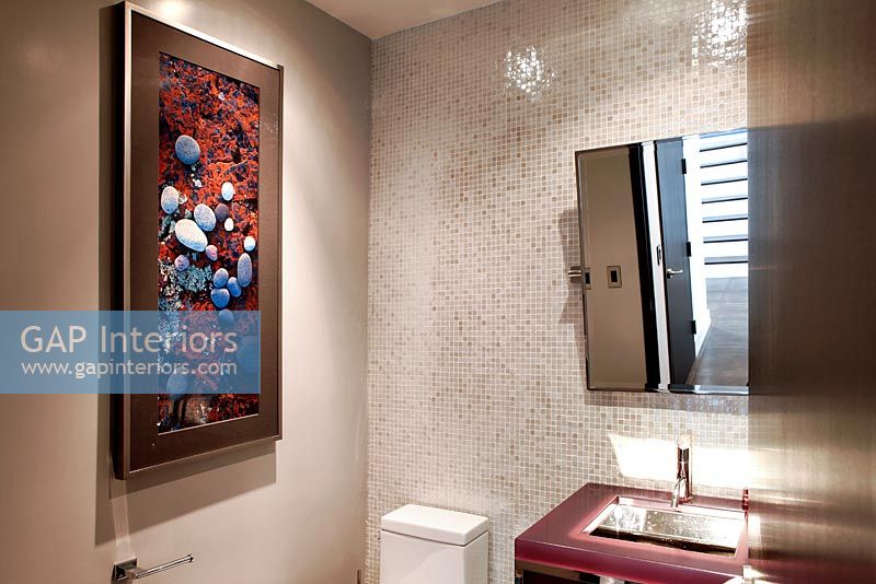Modern bathroom with artwork