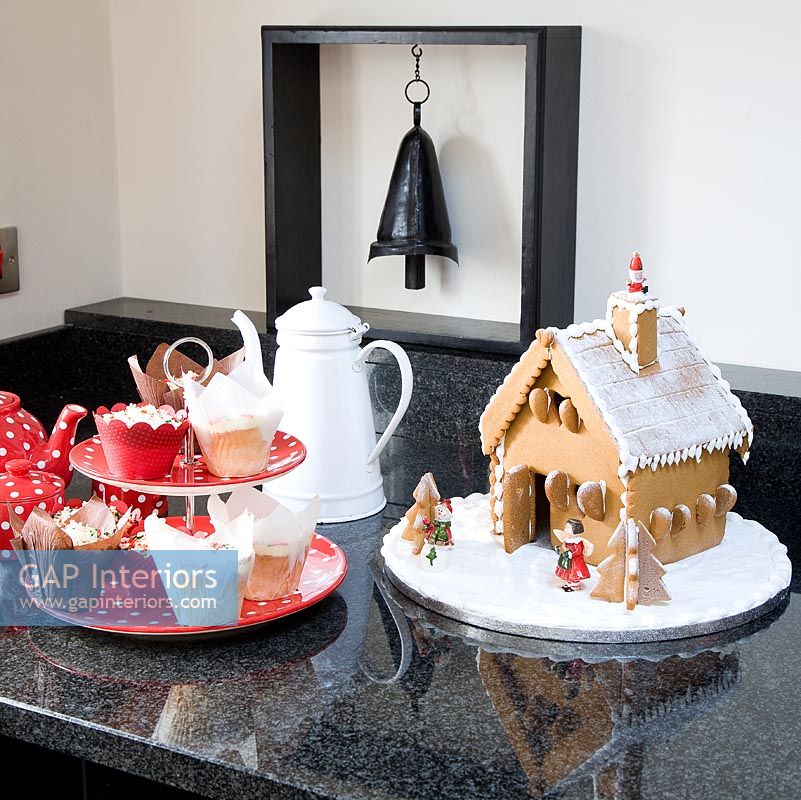 Christmas cakes and pastries on kitchen counter