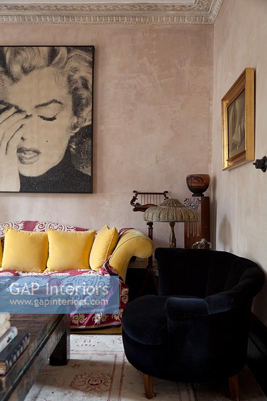 Monroe poster on living room wall
