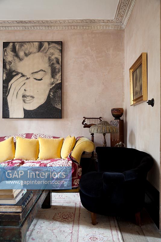 Monroe poster on living room wall