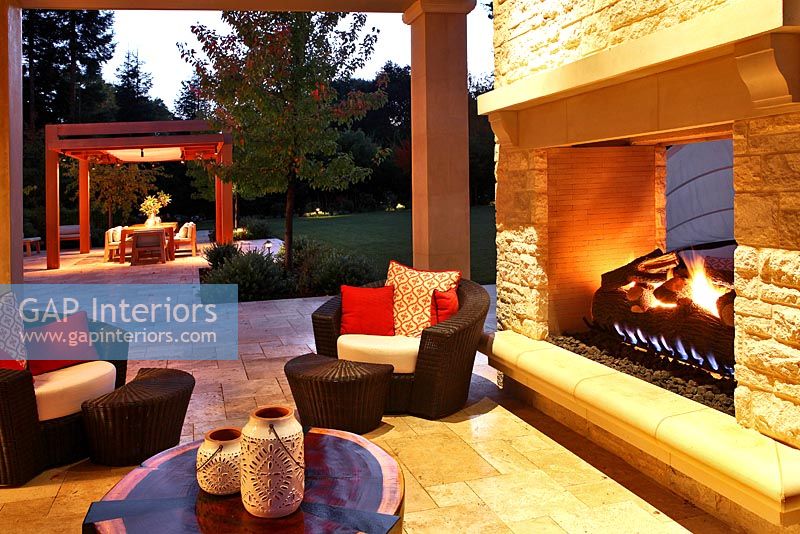 Villa patio with exterior fireplace