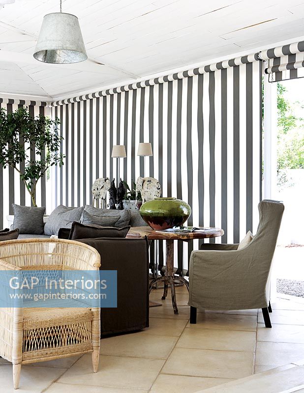 Classic veranda with striped awning
