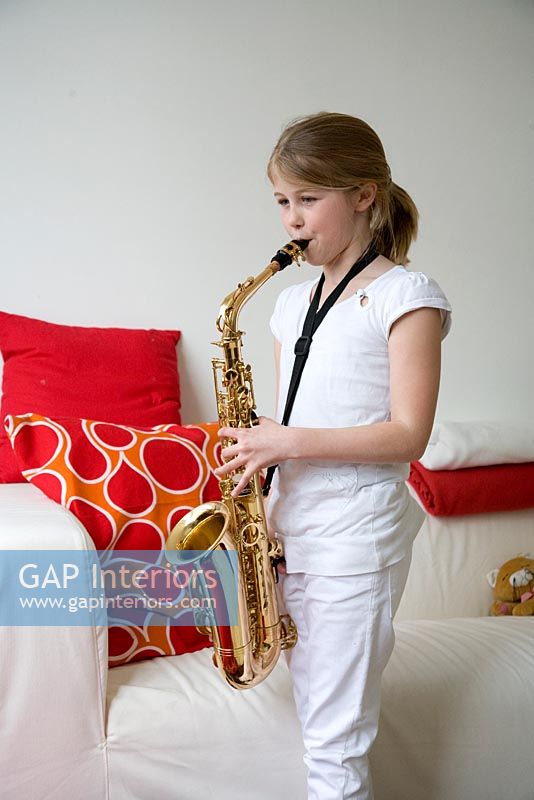Girl playing saxophone