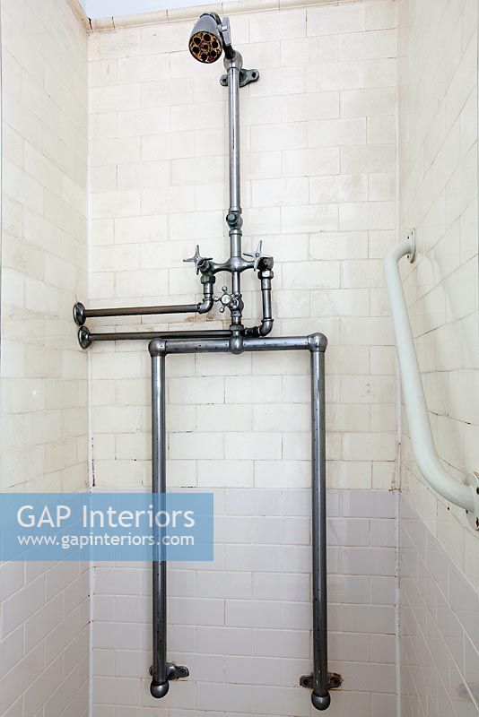 Industrial shower with water pipes