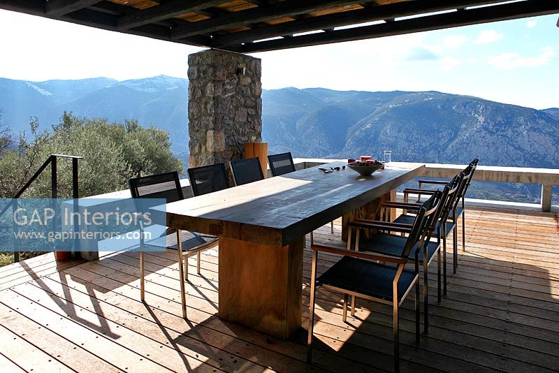 Outdoor eating area with view of mountains
