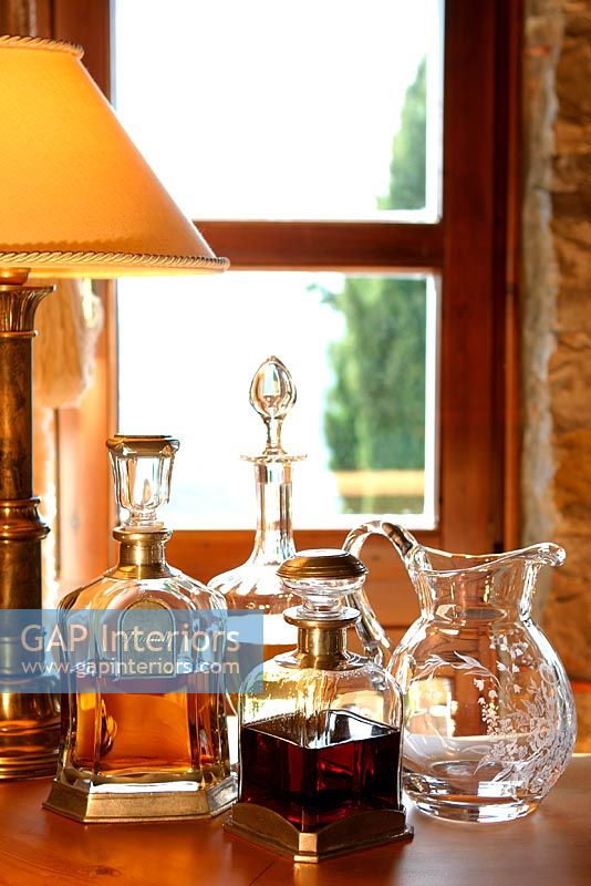 Crystal and glass decanters and bottles 
