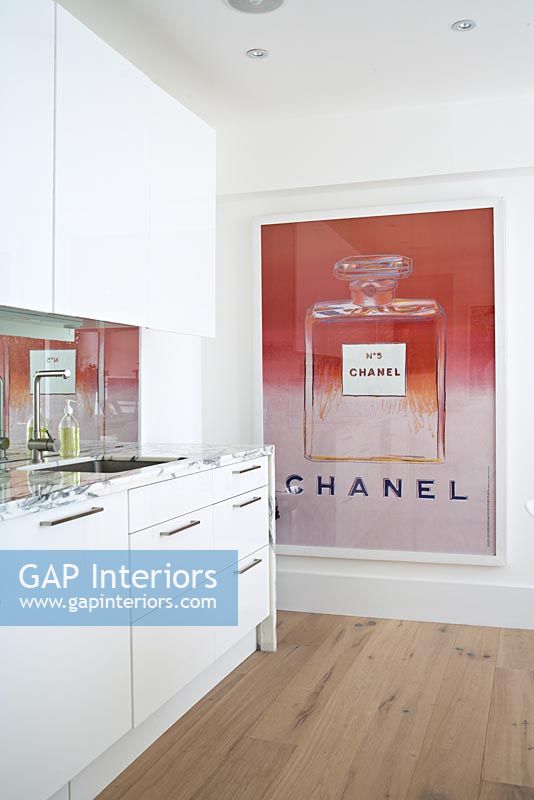 Contemporary kitchen with large poster