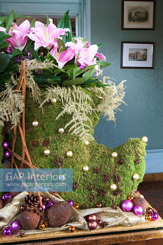 Arrangement of Lilies and Astilbe in moss 'boots'