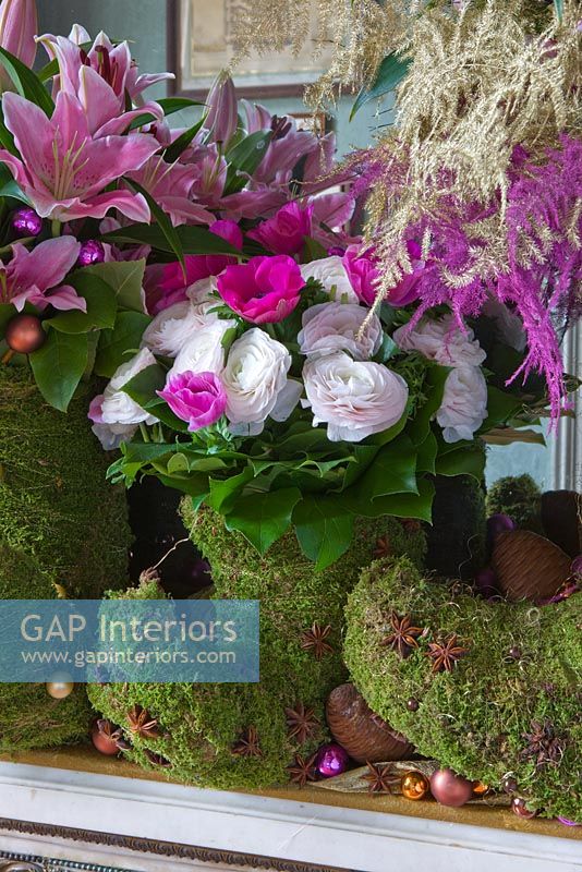 Arrangement of Roses, Astilbe and Lilies in moss 'boots'