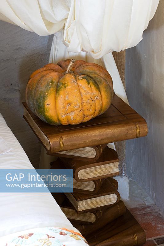 Pumpkin on unusual bedside table