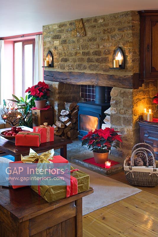 Country living room at Christmas with Poinsettias