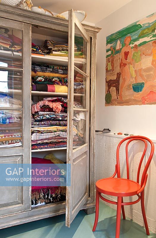 Cabinet of colourful fabrics