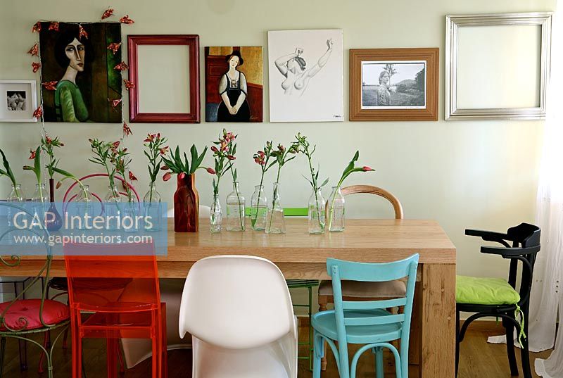 Modern dining table with mismatched chairs
