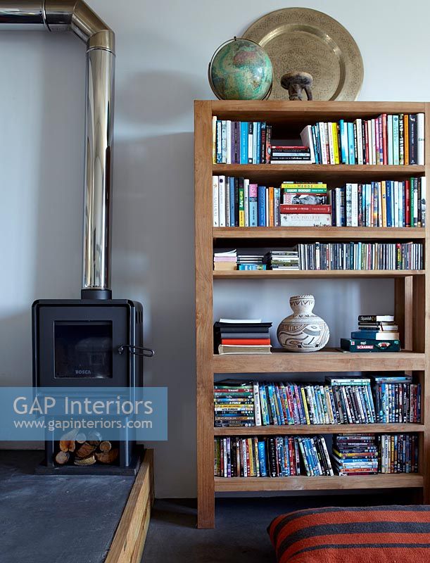 Wood burning stove and wooden bookshelves