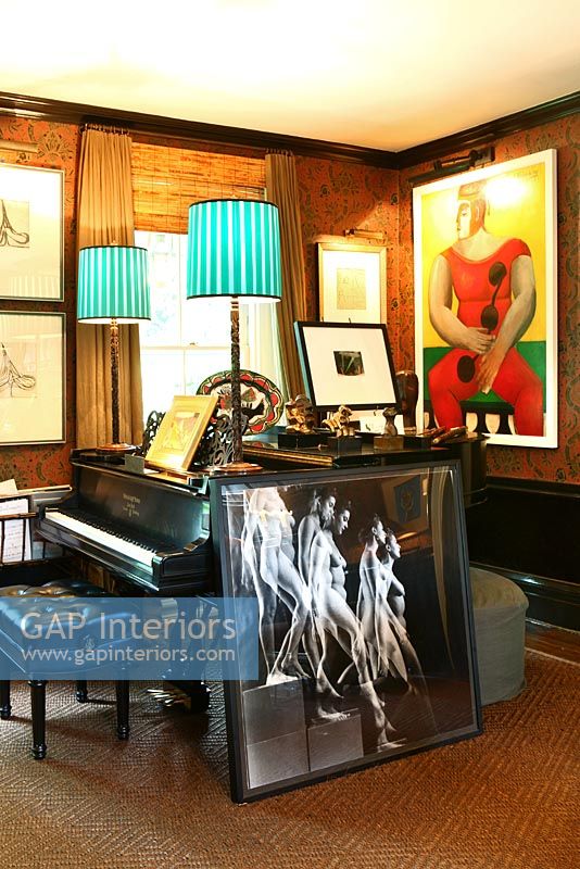 Grand piano with colourful art display