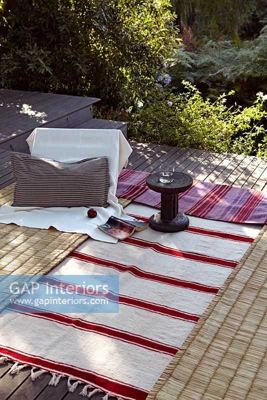 Rugs on decked patio