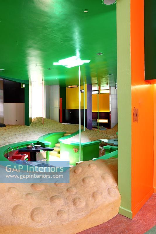 Colourful room with kitchen area