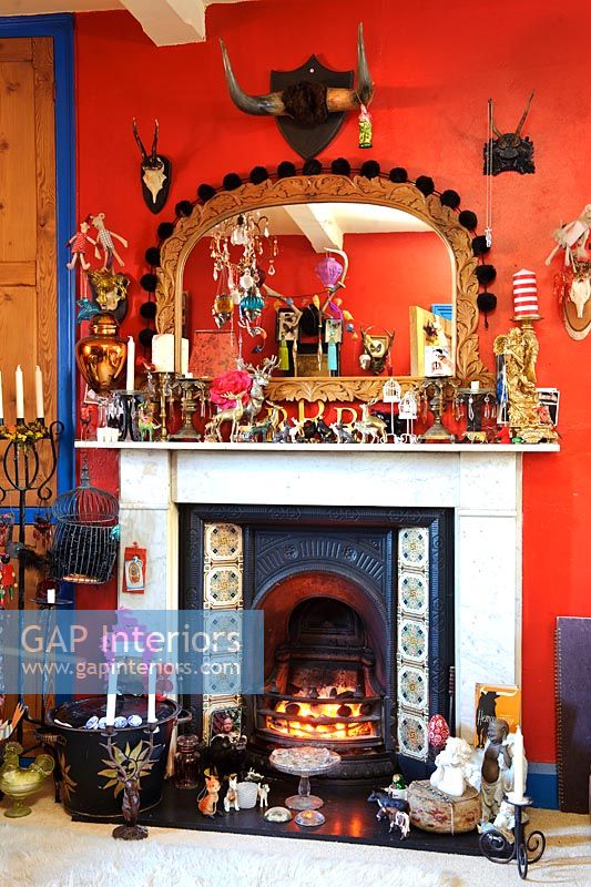 Colourful displays around period fireplace