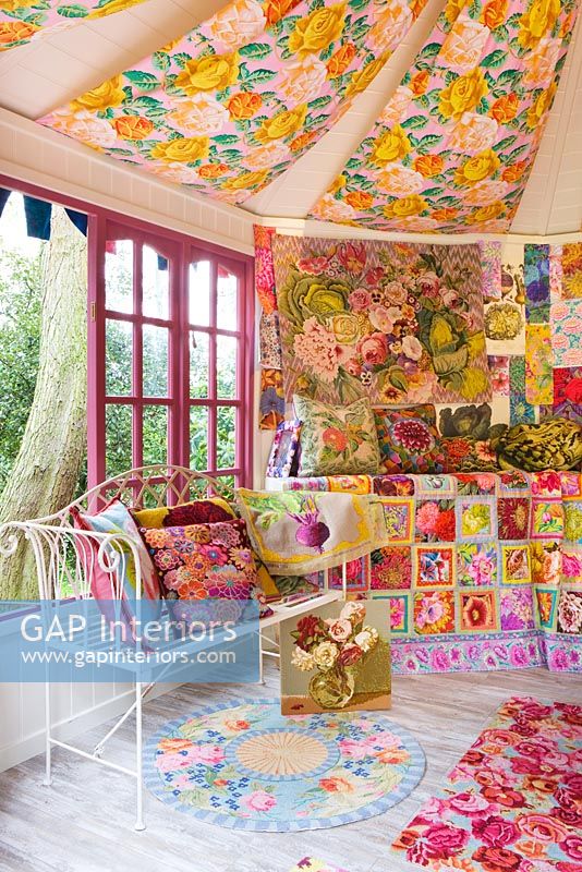Inside of shed decorated by Kaffe Fassett with needlepoint designs at RHS Chelsea Flower Show 2012