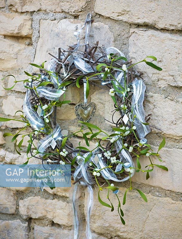 Christmas wreath with Mistletoe and ribbon
