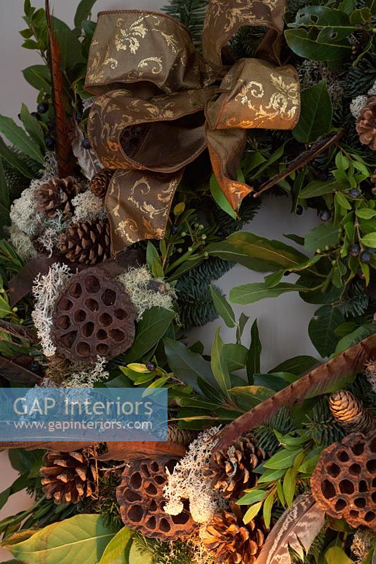 Christmas wreath of Pine cones, Lotus seed heads and feathers