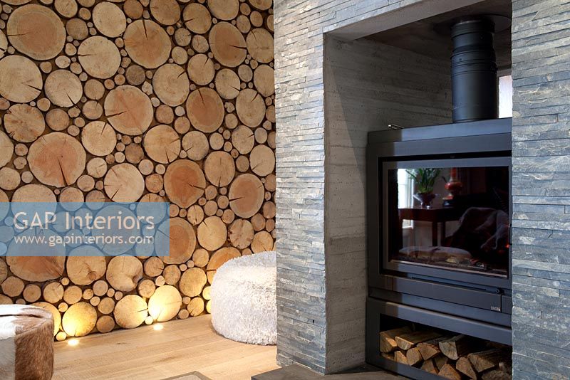 Slate fireplace and log feature wall