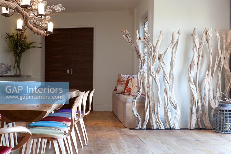 Dining room with driftwood sculpture