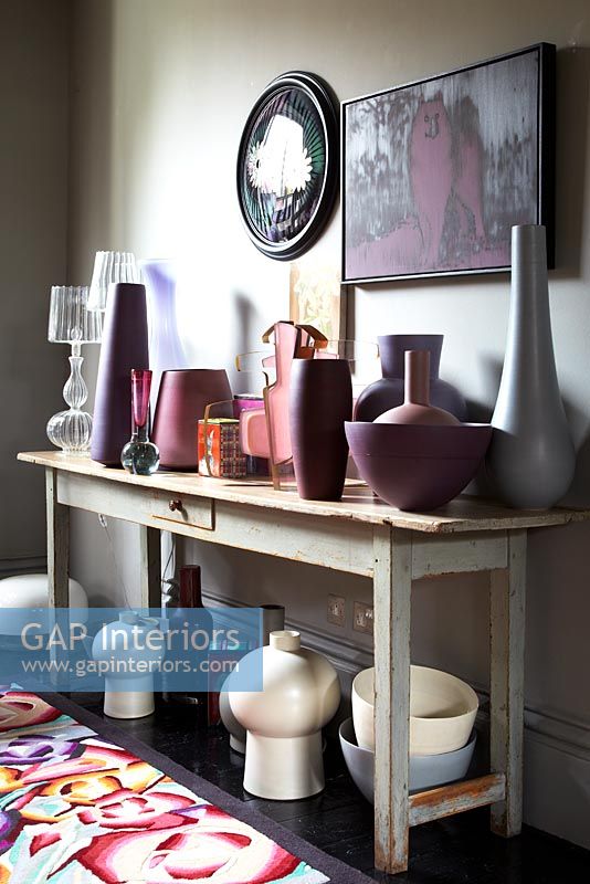 Display of vases on wooden table