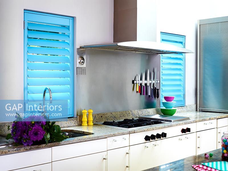 Modern kitchen with turquoise shutters