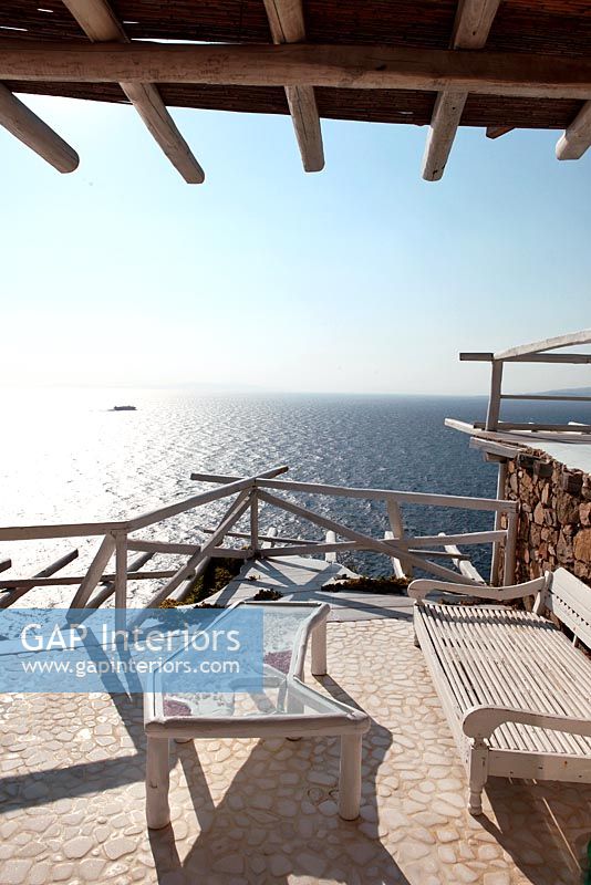 Compact patio overlooking sea, Greece