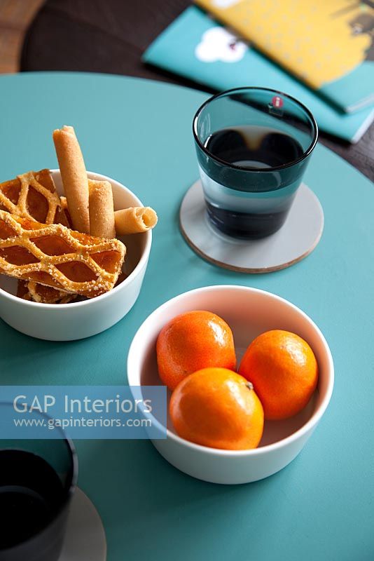 Snacks on turquoise coffee table