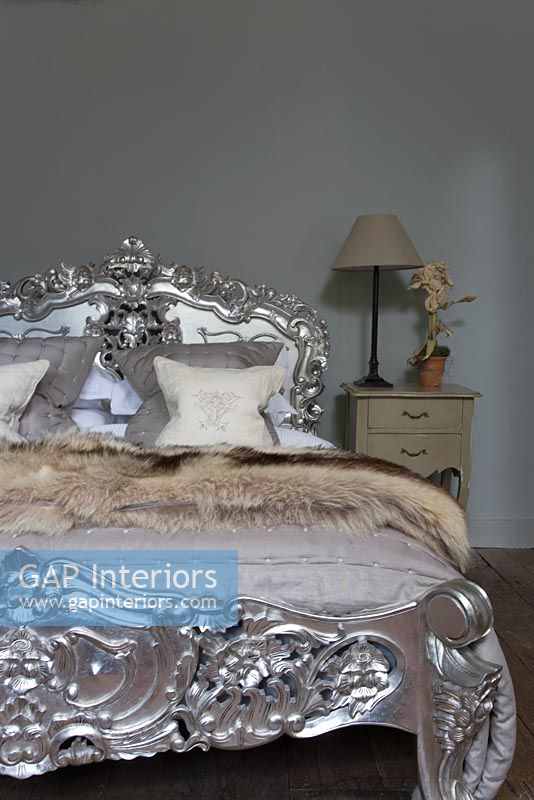 Ornate silver bed