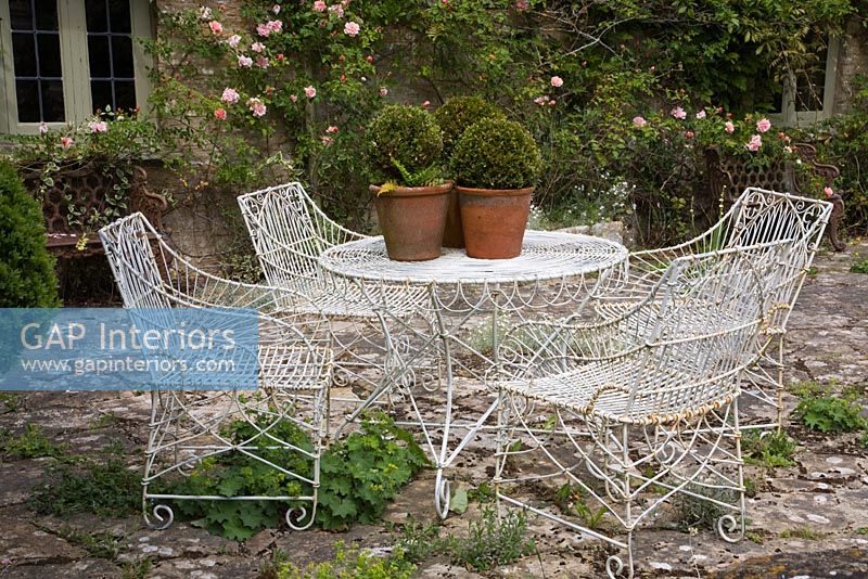 Wirework garden furniture on patio