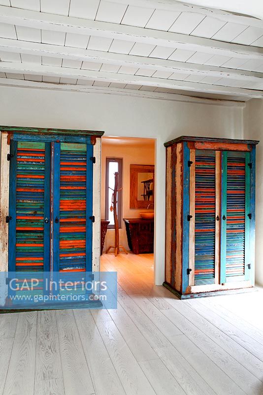Colourful wooden wardrobes