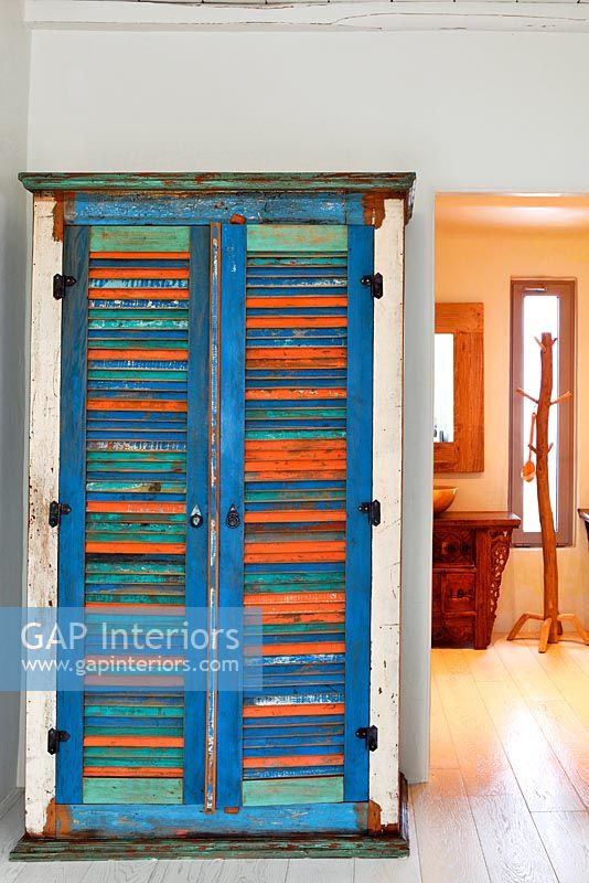 Colourful wooden wardrobe