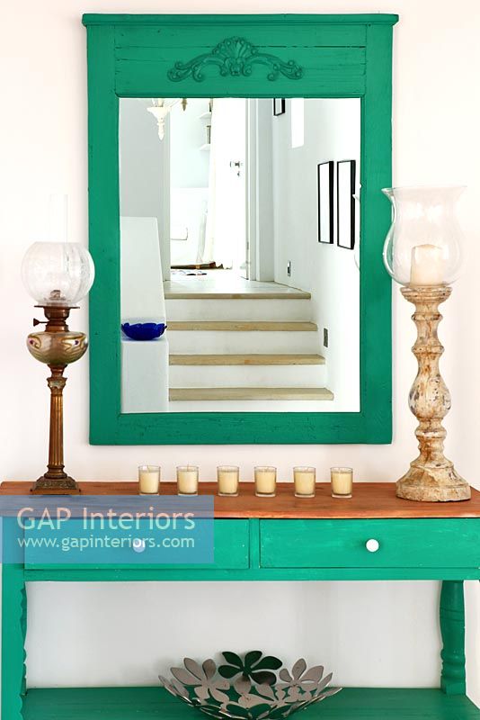 Green painted console table and mirror