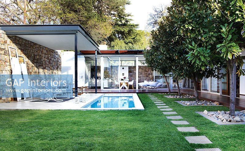 Modern house and garden with pool
