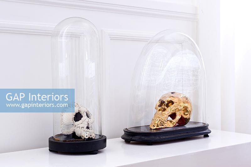 Ornaments displayed in bell jars