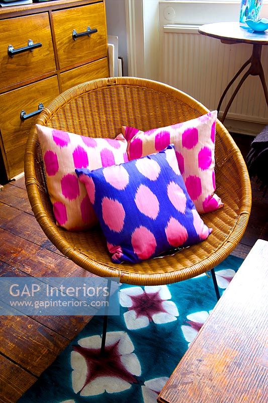 Patterned cushions on retro chair