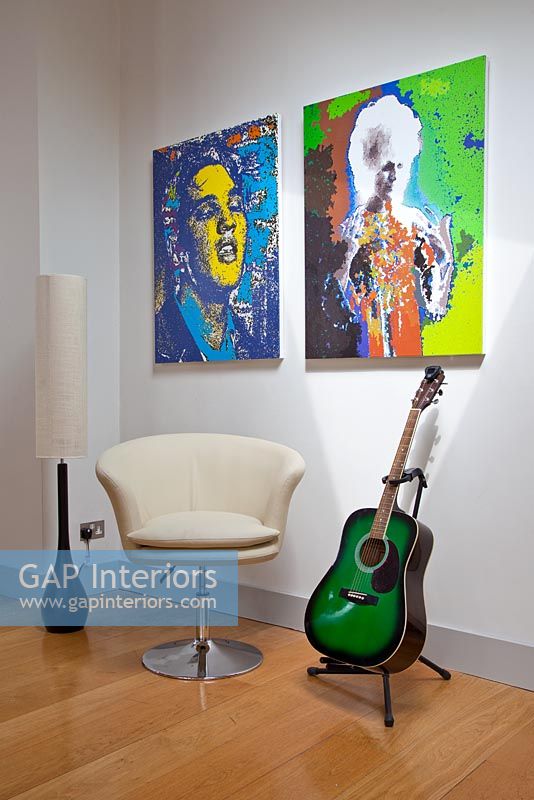Music themed artwork and guitar