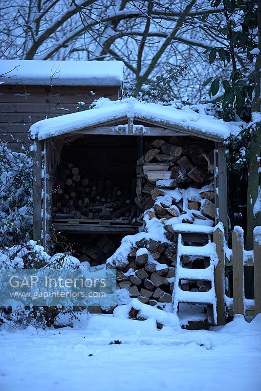 Wood store in snow