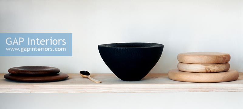 Wooden shelf with bowls