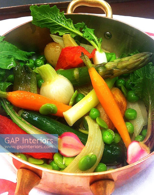 Vegetables in copper saucepan
